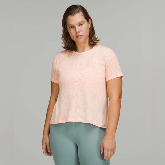 Lululemon Train to Be Short Sleeve Shirt in Ripple Wave White / Highlight Orange - Picture 1 of 9